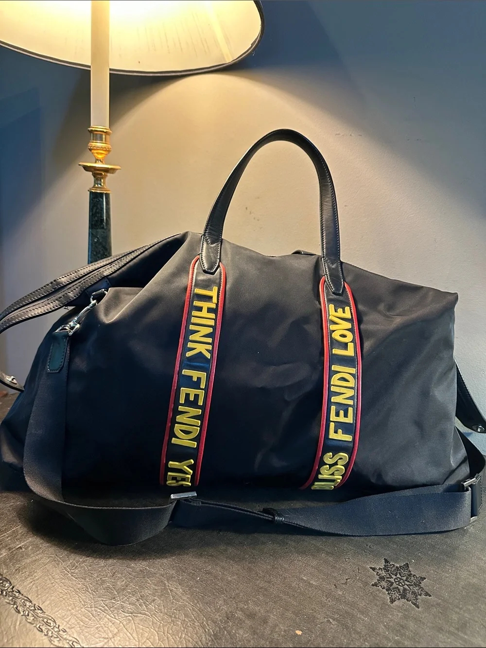 Fendi Black Duffel Bag with Yellow and Red Logo Straps